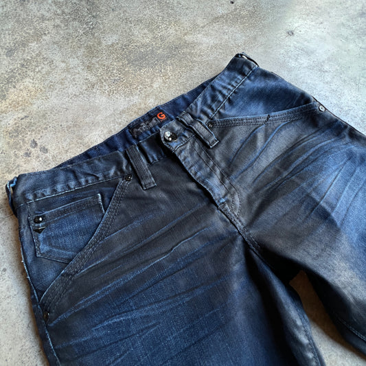 Waxed flared Jeans