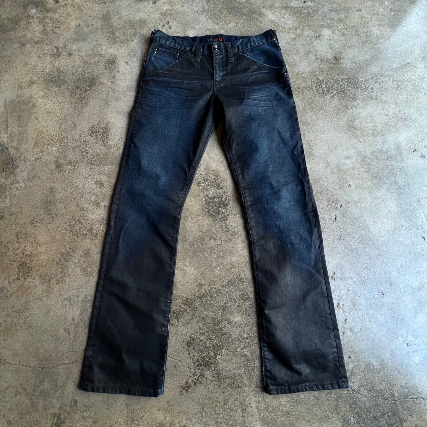 Waxed flared Jeans
