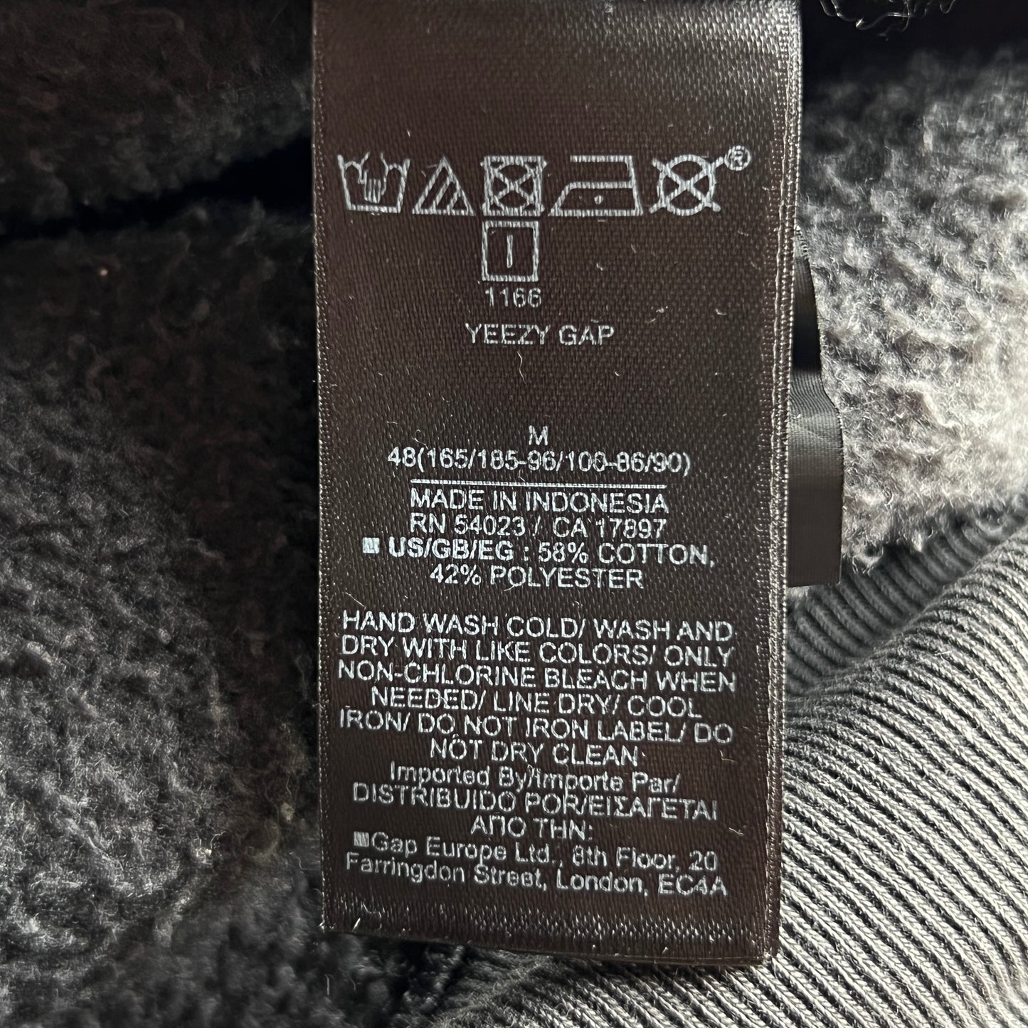 Distressed Mockneck Sweater Balenciaga Engineered